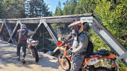 Break time at the bridge. With no set schedule, riders were free to come and go and lay down as many miles as they wished. Photo: Charles Landry