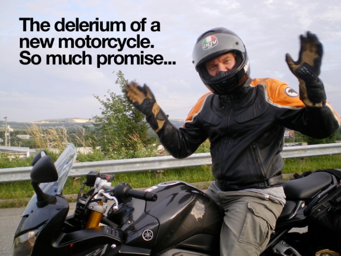 Waving maniacally as I ride my Yamaha FS-1 (Fazer 1000 in Europe) home for the first time.