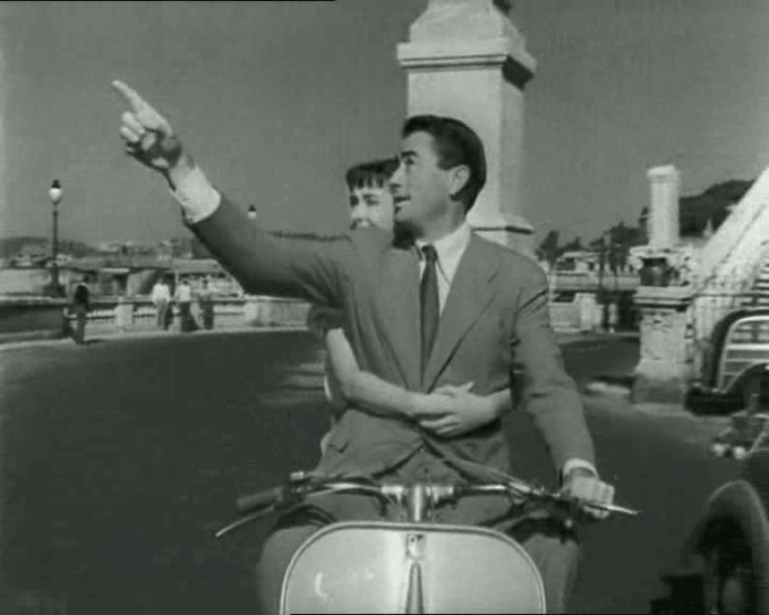 There is no denying that this image makes Vespa serious cool. But who among us has the Hollywood looks and can tool around post-war Rome in a suit with Audrey?